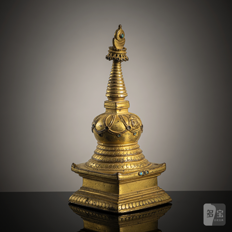 A GILT-BRONZE STUPA